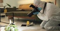 Csi, photographer and evidence at crime scene for investigation of house burglary or murder analysis. Forensic, person Royalty Free Stock Photo