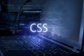 CSS inscription against laptop and code background. Technology concept. Learn programming language Royalty Free Stock Photo