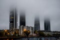 The Cuatro Torres Business Area in fog, Madrid Royalty Free Stock Photo