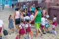 CUBA - APRIL 7, 2016: Schoolchildren with their parents going to school