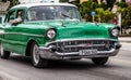 Cuba caribbean a classic car drived on the street in havana Royalty Free Stock Photo