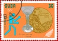 Postage stamp printed in Cuba with a picture of a boxer and Olympic medal, with the inscription `Boxing, +81 kg` from the series ` Royalty Free Stock Photo