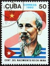 CUBA - CIRCA 1990: A stamp printed in Cuba shows flags and Ho Chi Minh, circa 1990.