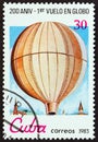 CUBA - CIRCA 1983: A stamp printed in Cuba shows flight J.Blanchard across English Channel, 1785, circa 1983. Royalty Free Stock Photo