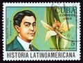 CUBA - CIRCA 1989: A stamp printed in Cuba shows Pedro H. Urena and Epidendrum fragrans Dominican Rep., circa 1989.
