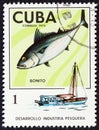 CUBA - CIRCA 1975: A stamp printed in Cuba shows Skipjack tuna (Katsuwonus pelamis) and fishing boat, circa 1975. Royalty Free Stock Photo