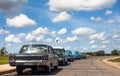 Cuba classic cars lined up drived on the road Royalty Free Stock Photo