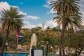 Cuba flag and statue of Jesus Christ on a hill overlooking the port and the bay of Havana. Royalty Free Stock Photo