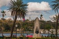 Cuba flag and statue of Jesus Christ on a hill overlooking the port and the bay of Havana. Royalty Free Stock Photo