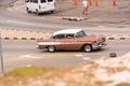 CUBA, HAVANA - MAY 5, 2017: American brown retro car on city street. Copy space for text.