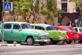 CUBA, HAVANA - MAY 5, 2017: American green retro cars in the par