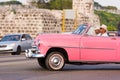 CUBA, HAVANA - MAY 5, 2017: American pink retro cabriolet on city street. Ã¯Â¿Â½opy space for text. Close-up.