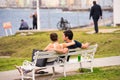 CUBA, HAVANA - MAY 5, 2017: Man and woman on the bench. Copy space for text.