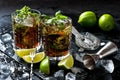 Cuba libre cocktail with rum, cola and lime, holidays party concept. Royalty Free Stock Photo