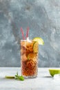 Cuba Libre or long island iced tea cocktail with strong drinks, cola, lime and ice in glass, Alcoholic or non-alcoholic cold Royalty Free Stock Photo