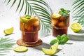 Cuba Libre with rum, cola, mint and lime in the glass. banner, menu, recipe place for text, top view Royalty Free Stock Photo