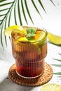 Cuba Libre with rum, cola, mint and lime in the glass on a light background, vertical image. top view. place for text Royalty Free Stock Photo