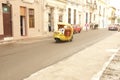 CUBA OLD HAVANA STREET SCENE WITH COCO TAXI Royalty Free Stock Photo