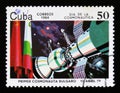 Cuba postage stamp shows Premier Bolgarian satellite in space, 1979, and flags, circa 1984