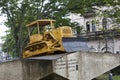 CUBA, SANTA CLARA- FEBRUARY 02, 2013: Monument to the derailment of the armored train. Caterpillar bulldozer used to break the rai