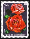 Cuba stamp with red rose