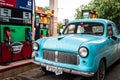 Cuba Varadero american blue Oldtimer parked at the gas station