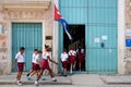 Cuban children entering a primary school in Havana