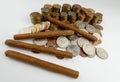 Cuban cigars with coins isolated on white Royalty Free Stock Photo