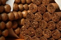 Cuban cigars in a large pile inside a humidor Royalty Free Stock Photo