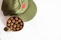 Cuban cigars rolled in banana leaf and military cap