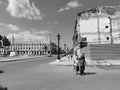 Cuban couple of older people walk in Havana