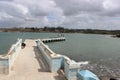 Cuban fishermen standing at the pier Royalty Free Stock Photo