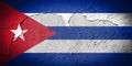 Cuban flag on cracked wall