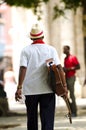 Cuban man wearing traditional panama straw hat playing an acoustic guitar. Cuba Royalty Free Stock Photo