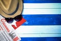 Cuban newspaper and national flag Royalty Free Stock Photo