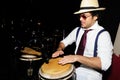 Cuban percussionist on black Royalty Free Stock Photo