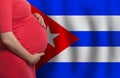 Cuban pregnant woman belly on flag of Cuba background