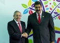 Cuban President Raul Castro greets Venezuelan President Nicolas Maduro