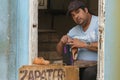 Havana, Cuba - 9 January, 2007: Cuban shoemaker working in the street