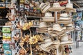 Cuban souvenirs for tourists: handmade wooden crafts, straw hats, iron tablets with retro cars.