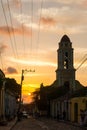 Cuban street sunset with oldtimer in Trinidad, Cuba Royalty Free Stock Photo