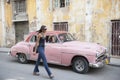 Cuban Woman Pink Taxi Car