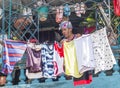 A Cuban women is hanging her laundry out to dry on her balcony in Havana Cuba