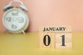 Cube calendar with date January 1st and books on the table.start new year 2024 Royalty Free Stock Photo