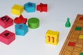 Cube, chips, wooden figures, a bright field for the game