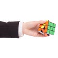 Cube Rubik in hand business woman jacket
