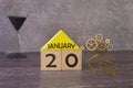 Cube shape calendar for January 20 on wooden surface with empty space for text,cube calendar for January.