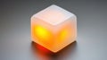 A cube-shaped object with a glowing yellow light inside. Royalty Free Stock Photo