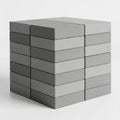 Stack of grey concrete building bricks forming a cube on a white background construction Royalty Free Stock Photo