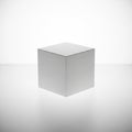 Cube with smooth surfaces and sharp edges is centrally positioned Royalty Free Stock Photo